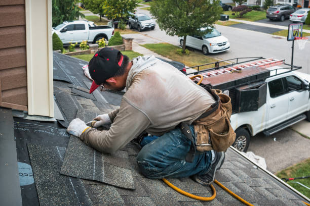 Professional Roofing technician working in Victor, ID